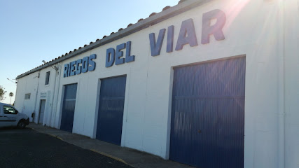 Riegos del Viar. Comunidad de regante. en Alcalá del Río. Comercio